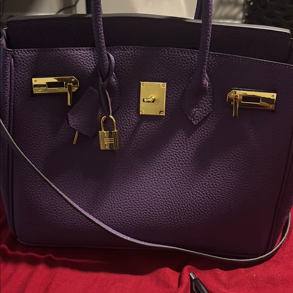 Elegant Purple Satchel with Gold Hardware